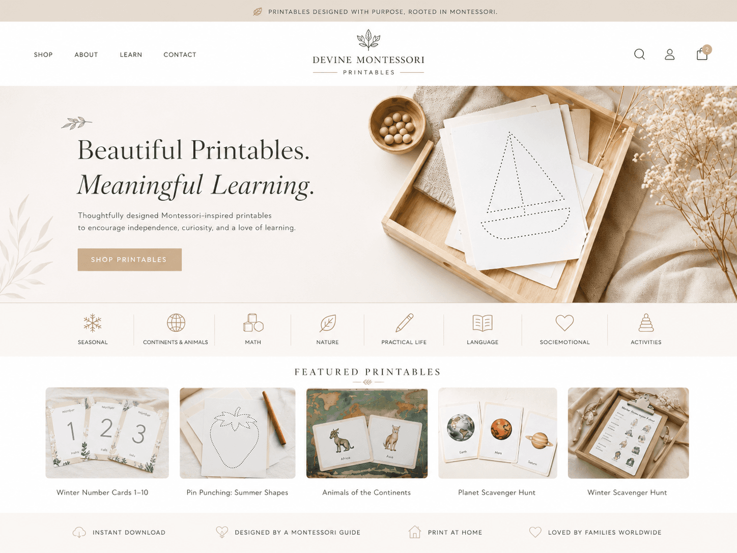 Montessori tracing printables arranged in a wooden tray with natural materials